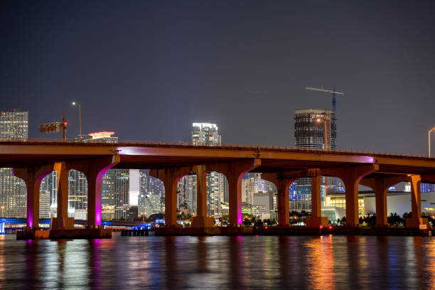 istock Night photo bridge blocking view of Downtown Miami FL 1328187596