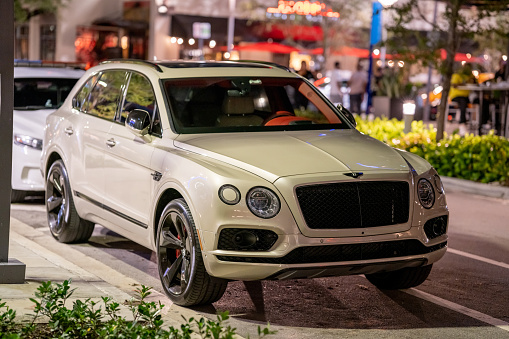 Miami, FL, USA - July 9, 2021: New Bentley Bentayga luxury SUV parked on the streets of Brickell Miami