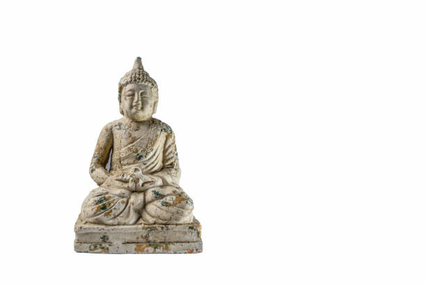 istock Generic zen stone ancient buddha statue with light shinning on the figure isolated on a white background 1328189132