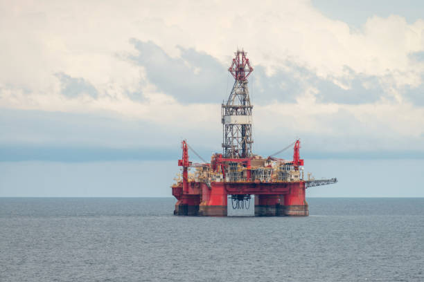 istock Offshore jack up rig in the middle of sea 1328189301