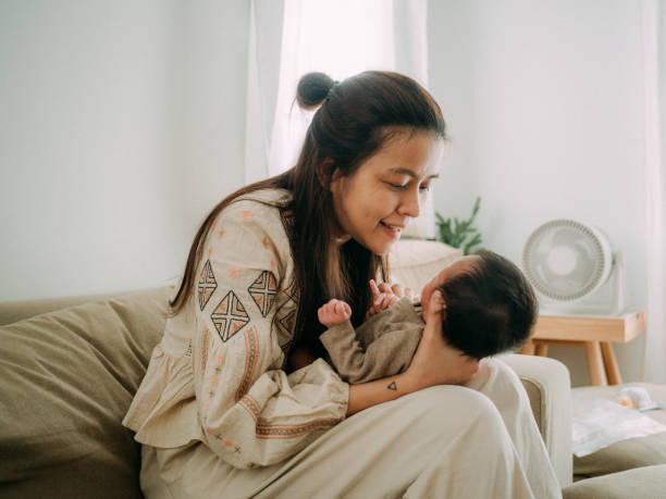 istock Baby and mother. 1328191037