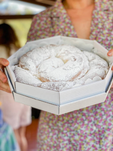 istock woman holding a typical sweet from Mallorca 1328191081