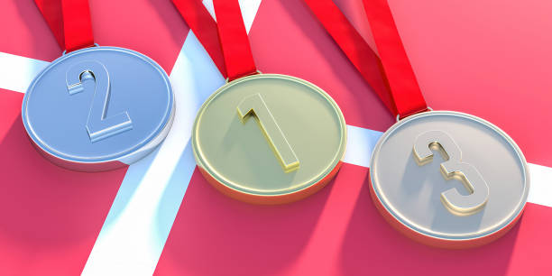 istock Winners medals set, golden, silver and bronze on Denmark flag background. 3d illustration 1328194431
