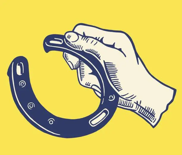 Vector illustration of Hand Holding a Horseshoe