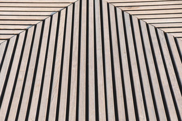 istock Abstract wooden striped background with pronounced shadows. 1328199094