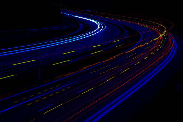 istock lights of cars with night. 1328201593