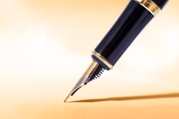 istock Fountain pen isolated, copy space, closeup shot 1328203116