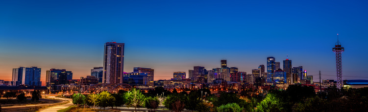 Tall buildings of downtown Denver Colorado blue hour night