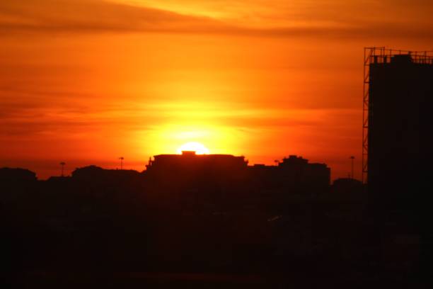 istock Colorful sunset with building silhouettes in Lisbon 1328204692