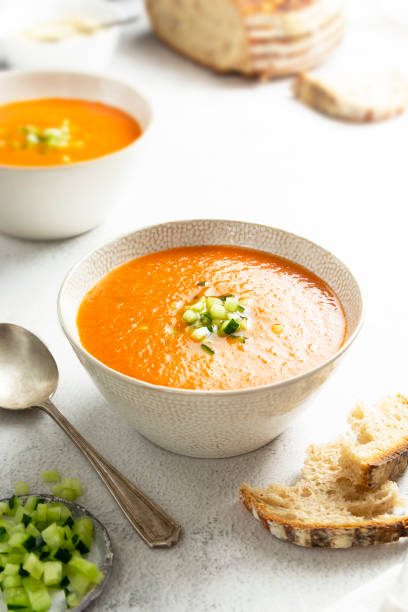 istock Gazpacho soup in white bowl, delicious cold tomato soup. 1328208303