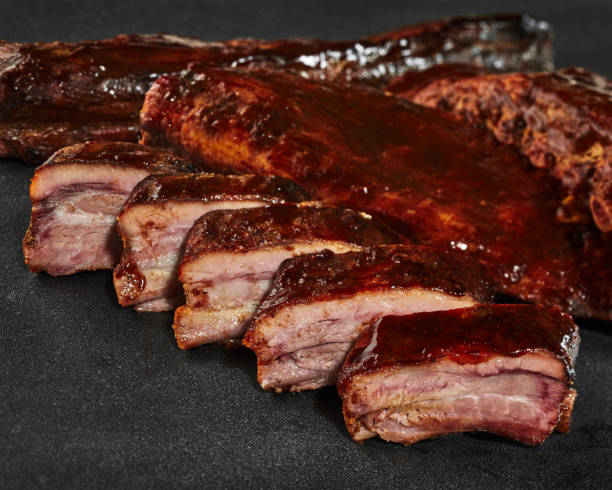 istock Sliced grilled pork ribs with barbecue sauce 1328208847