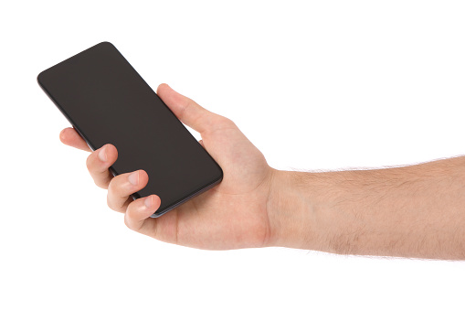 Man hand holding the black smartphone with blank screen. isolated on white background. High resolution photo. Full depth of field.