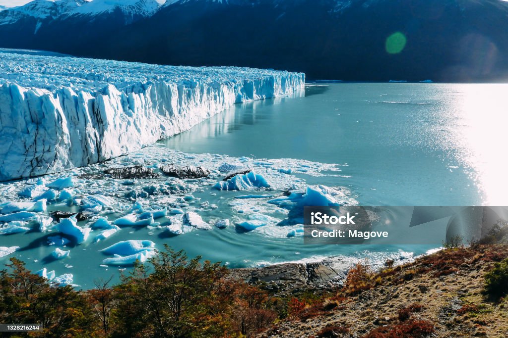 Famous Perito Moreno Glacier in the Patagonia, Argentina Famous Perito Moreno Glacier in the Patagonia, Argentina. Pieces of the glacier detached and floating. El Calafate Stock Photo