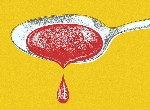 Red Liquid in a Spoon