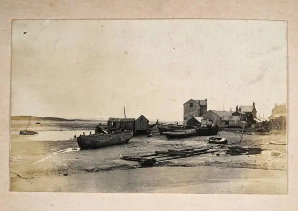 Antique photograph, Boats and hulks beached at low tide, Location unknown possibly Netherlands, Victorian 19th Century