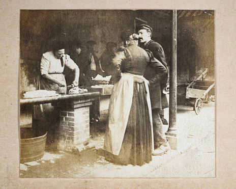 Antique photograph, Couple buying meat from a butcher, Market, Location Unknown, possibly Netherlands, Victorian 19th Century