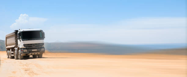 istock truck on a dirt road 1328219938