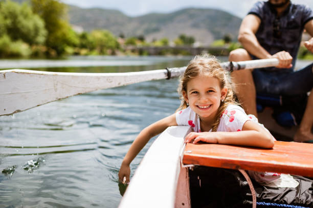 istock Young girl enjoying boat ride 1328221141