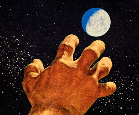 Hand Reaching Toward the Moon