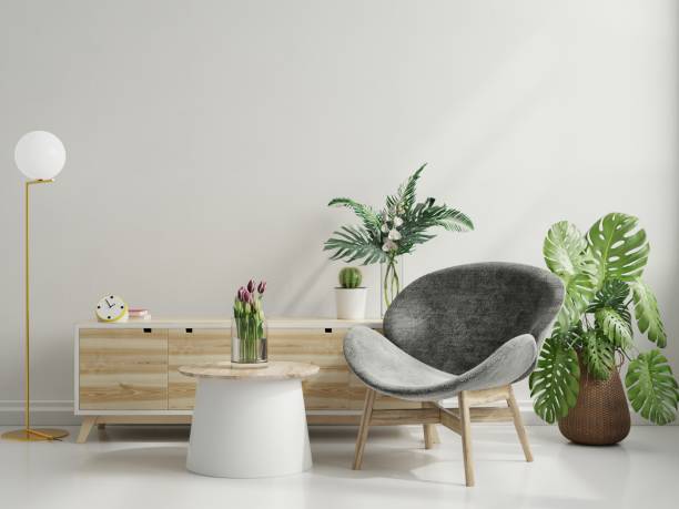 istock Modern minimalist interior with an armchair on empty white wall background. 1328243938