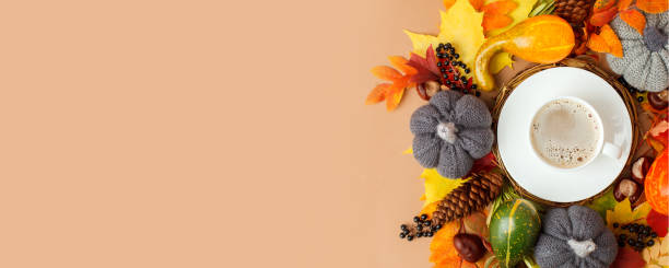 istock Autumn flat lay composition with dry leaves wreath frame and coffee latte cup on neutral beige background. Creative autumn, thanksgiving, fall, halloween concept. Top view, copy space, seasonal menu 1328249237