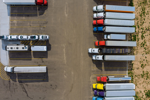 Aerial view of parking lot with trucks on transportation of truck rest area trailers logistics dock