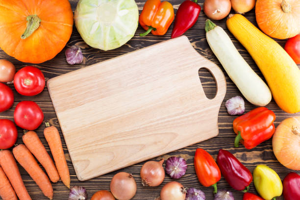 istock Cutting Board Mockup with Fresh Vegetables. 1328260789