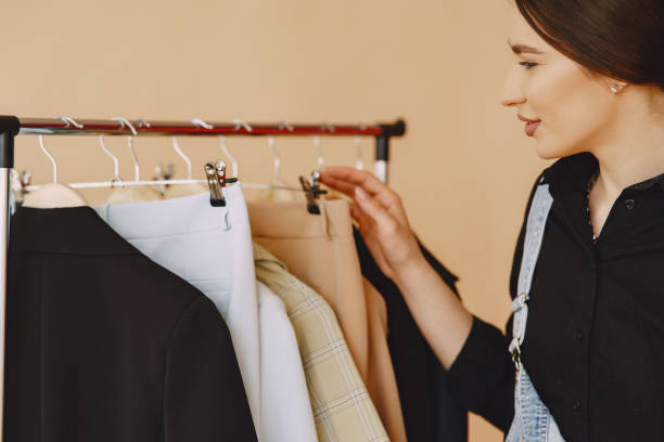 istock Woman in a studio with many clothes 1328266828