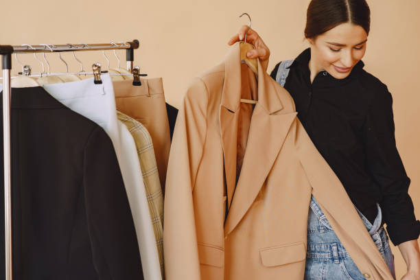 istock Woman in a studio with many clothes 1328266829