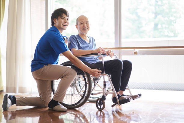 istock Wheelchair-riding elderly and caregivers 1328269788