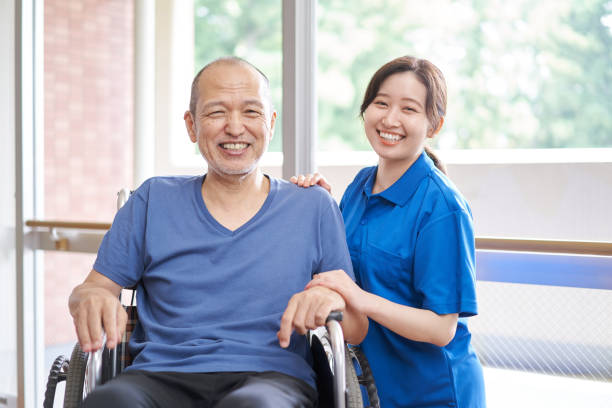 istock Wheelchair-riding elderly and caregivers 1328269797