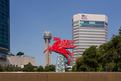 Dallas, Texas, USA - June 17th, 2021: Red Pegasus figure in Dallas downtown