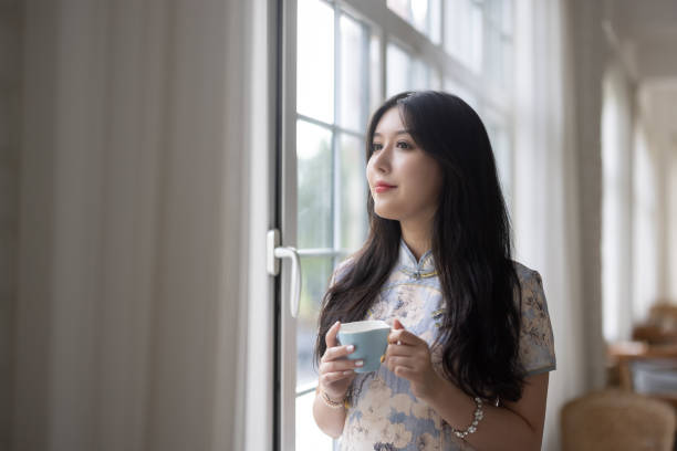 istock girl drinking coffee in a cafe 1328277947
