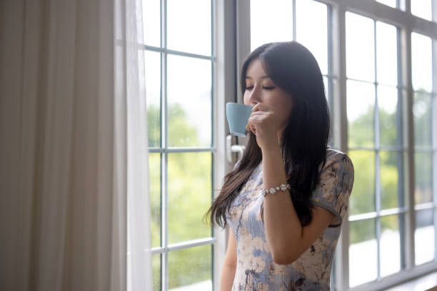istock girl drinking coffee in a cafe 1328277951