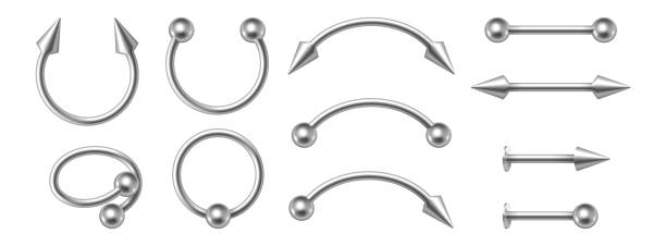 Piercing jewelry. Realistic metal nose rings. 3d earrings pierced face body accessories set Piercing jewelry. Realistic metal nose rings. 3d earrings pierced face body accessories set. Silver cones and balls, metallic oops barbells. Vector illustration piercing stock illustrations