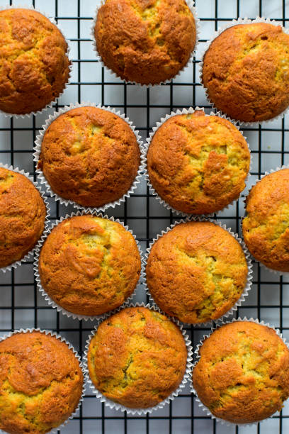 istock Home made banana bread muffins  on a cooling rack 1328279663