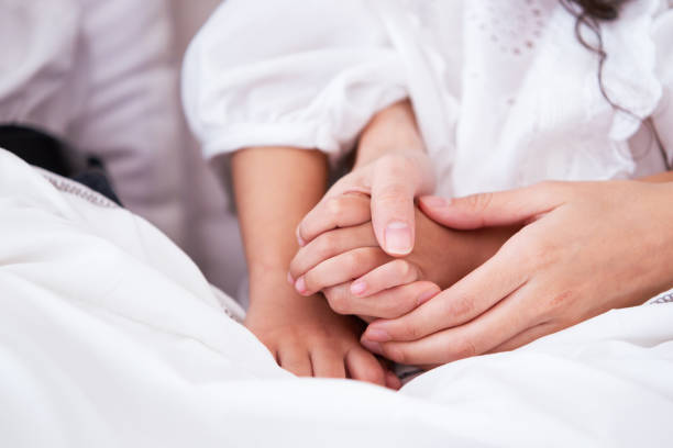 istock Parent taking care their sick childern. 1328280786