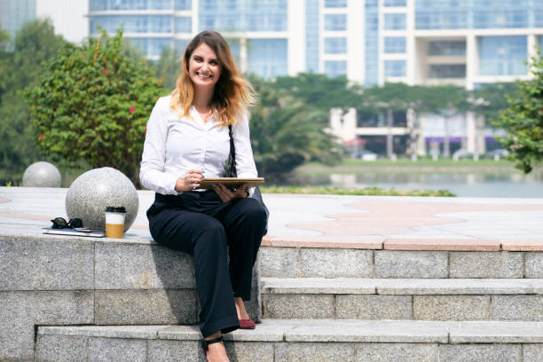 istock Business Lady Working on Tablet 1328281624
