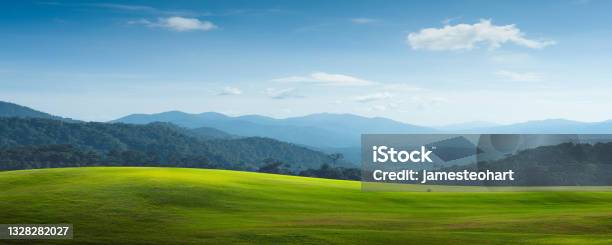 Panorama View Of Greenfield And Mountain Landscape Stock Photo - Download Image Now - Mountain, Sky, Horizon