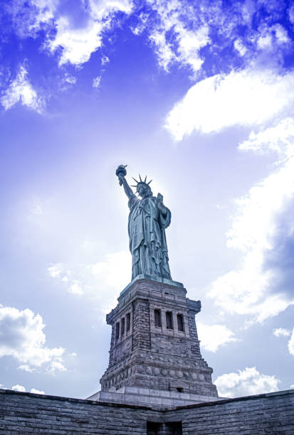 Statue of Liberty with a purple dramatic sky