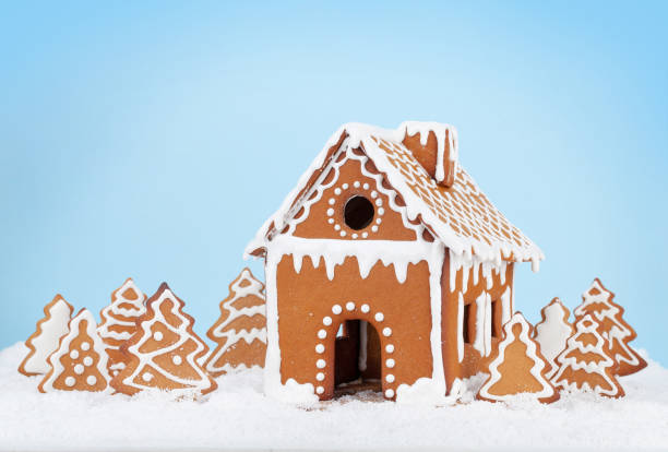 istock Christmas greeting card with gingerbread house 1328283458