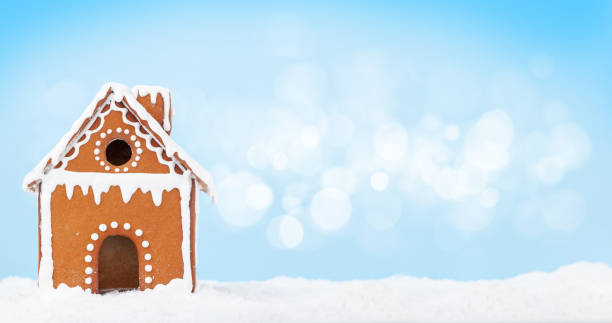 istock Christmas greeting card with gingerbread house 1328283580