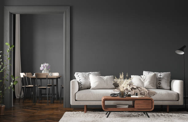 istock Home interior, modern dark living room interior, black empty wall mock up 1328283946