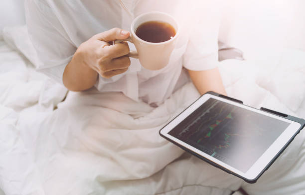 istock Businessman holding tablet and checking analyzing sales data growth graph chart and stock market on global networking. Business strategy, planning and digital marketing on blue background. 1328286002