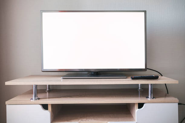istock Big empty screen of modern tv with white space for mock up 1328289711