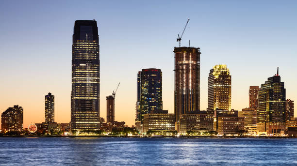 istock Panoramic view of New Jersey skyline at dusk, US. 1328295582