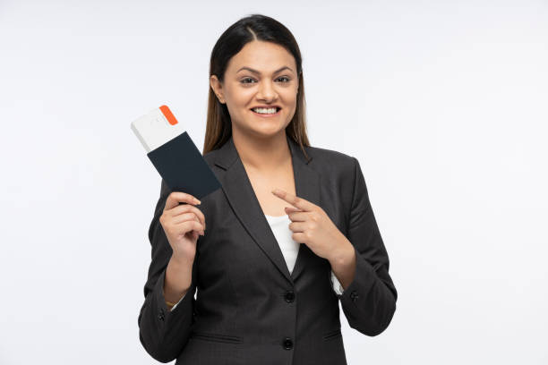 portrait of a young business women standing isolated over white background Adult, young women, India, Indian ethnicity, business women, india airport stock pictures, royalty-free photos & images