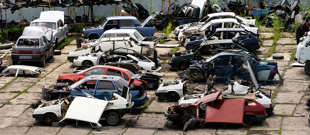 Recycling yard for old cars. Cars dump