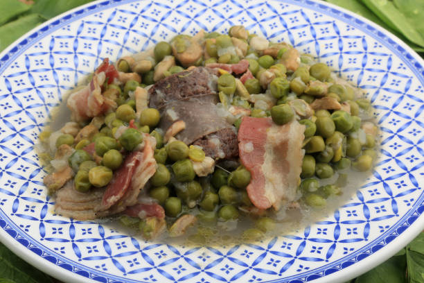 istock greenpeas with sausage and bacon ready to eat 1328296475