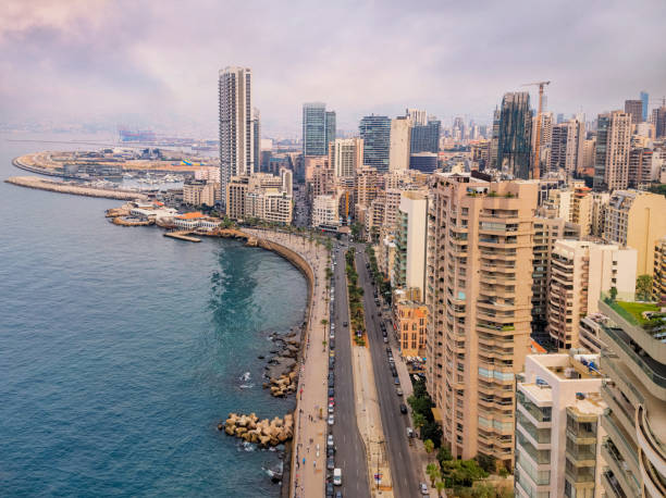 istock Beirut's corniche sea front with high rise residential buildings and pedestrian walkway along the Mediterranean sea, Lebanon 1328298060